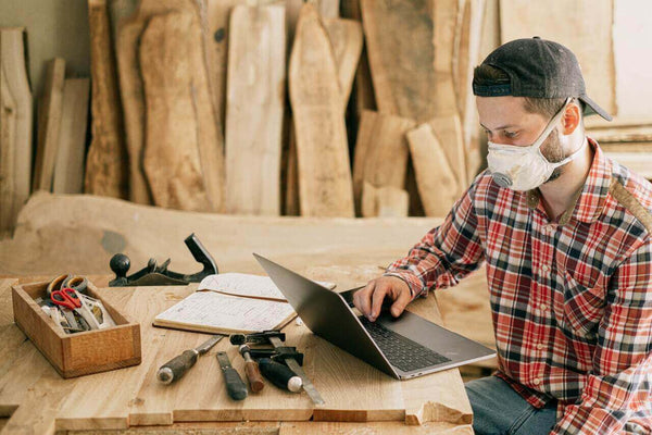 carpetenter working on his laptop