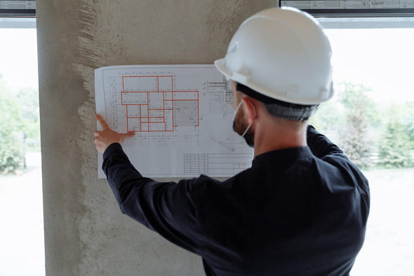 Architect reviewing drawings