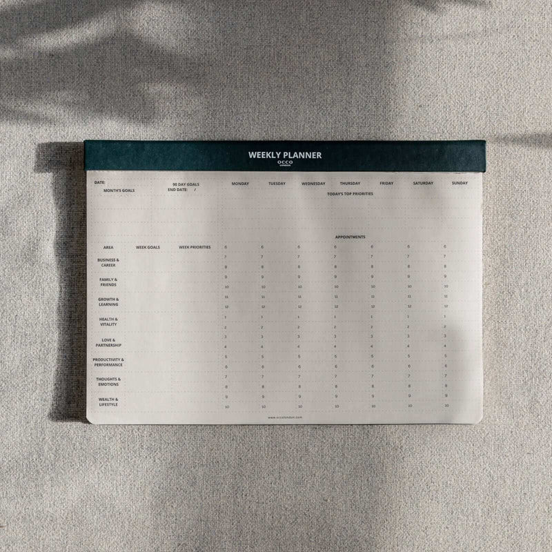 A4 green weekly planner pad with shadows